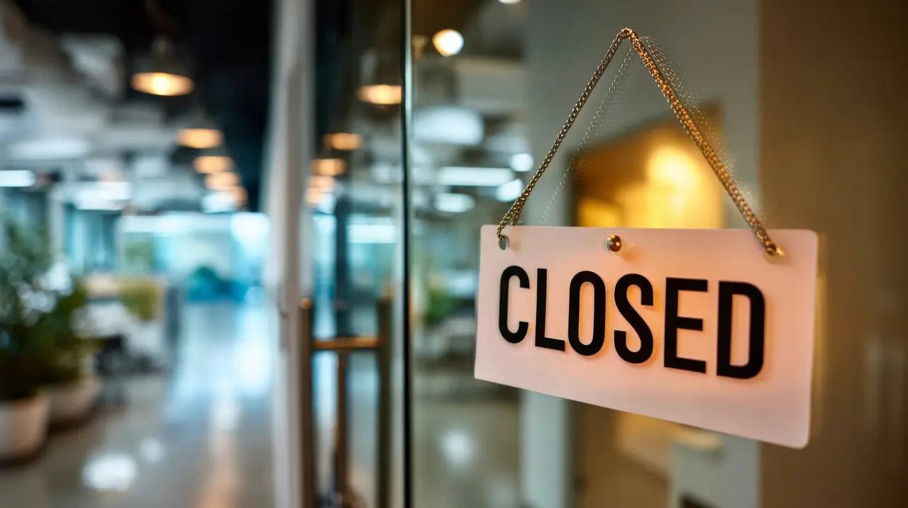"Closed" sign on an office door after hours